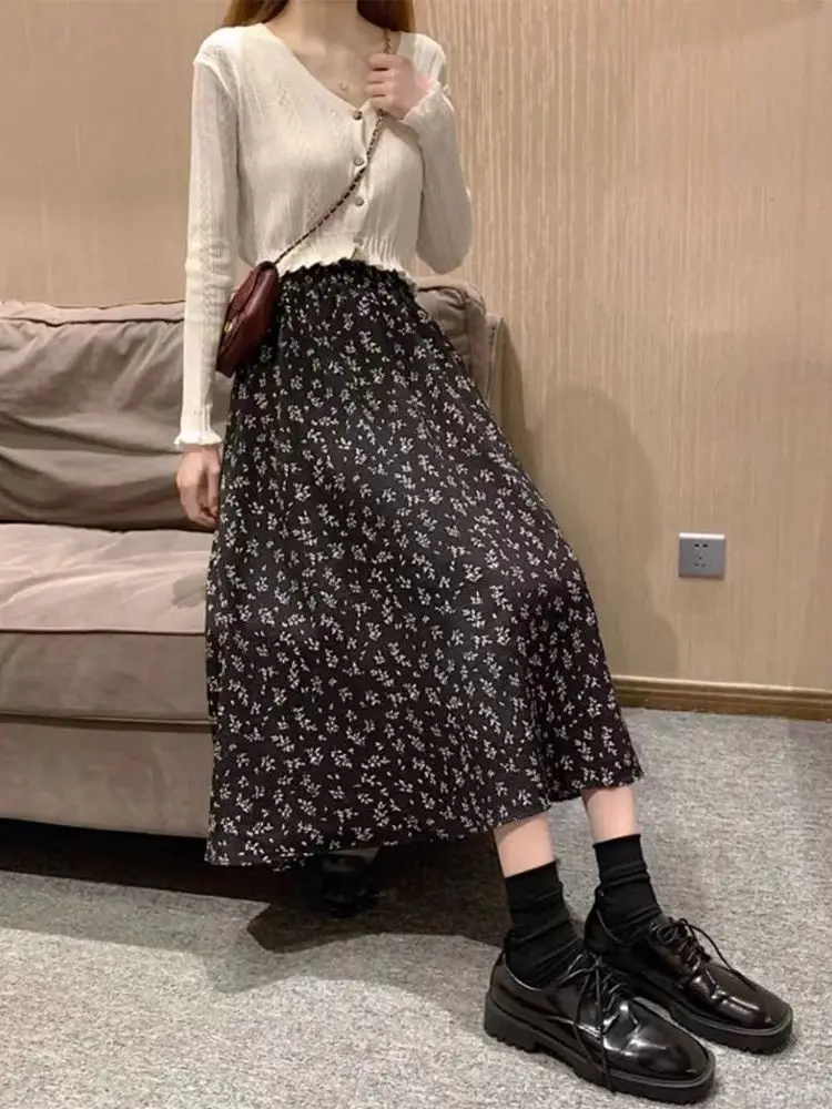 Spódnica midi w kwiatowy wzór plus size, rozkloszowana, wyszczuplająca, zakrywająca biodra, wiosenno-jesienna, damska, codzienna, z wysokim stanem, z włókna poliestrowego.