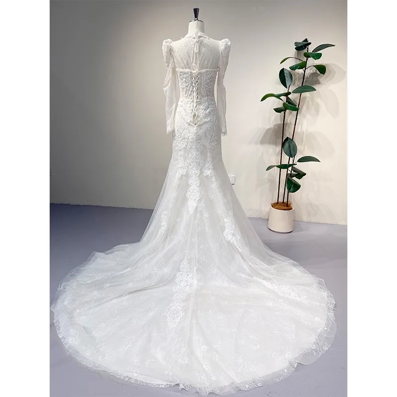 

A light and luxurious fishtail dress with gauze knot long sleeves for welcome