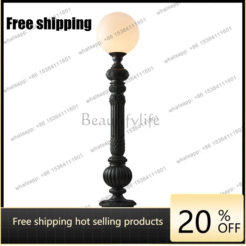 XX French medieval style living room sofa next to high-value carved atmosphere lamps
