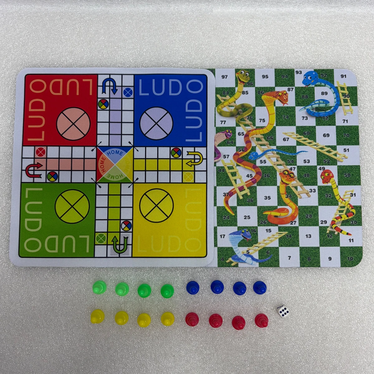 2-in-1 Set Includes Both Ludo and Snakes and Ladders Complete with 24cm Standalone Rubber Game Board 16Pcs Plastic Pieces 2 Dice
