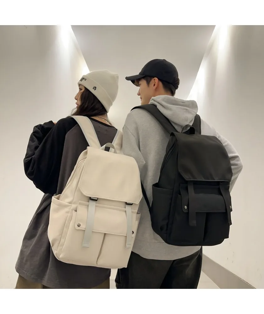 Light purple casual student backpack with flip top design multi pocket water resistant fabric for daily school use and casual