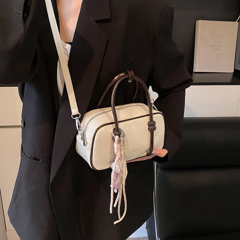 Niche contrasting color portable bowling bag female Korean version small square bag simple and versatile underarm messenger bag