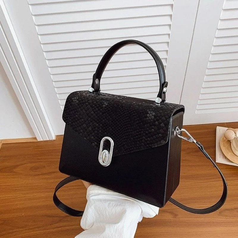 Women's Handbag Made Of Star-Patterned Leather Boasting Designer Inspired And Paris Commuter Vintage Look​