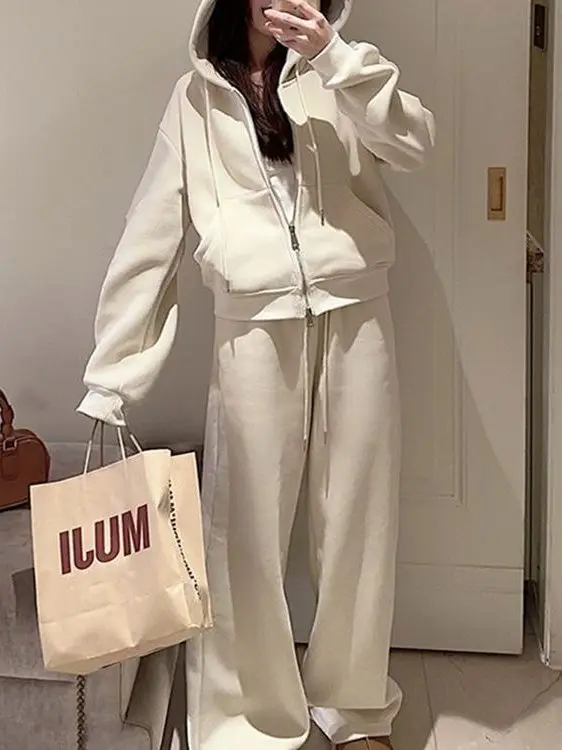 

Стильный повседневный спортивный костюм цвета абрикос для женщин: весна-осень 2026, новый молодежный стиль, худи и спортивные брюки, модный комплект из двух предметов