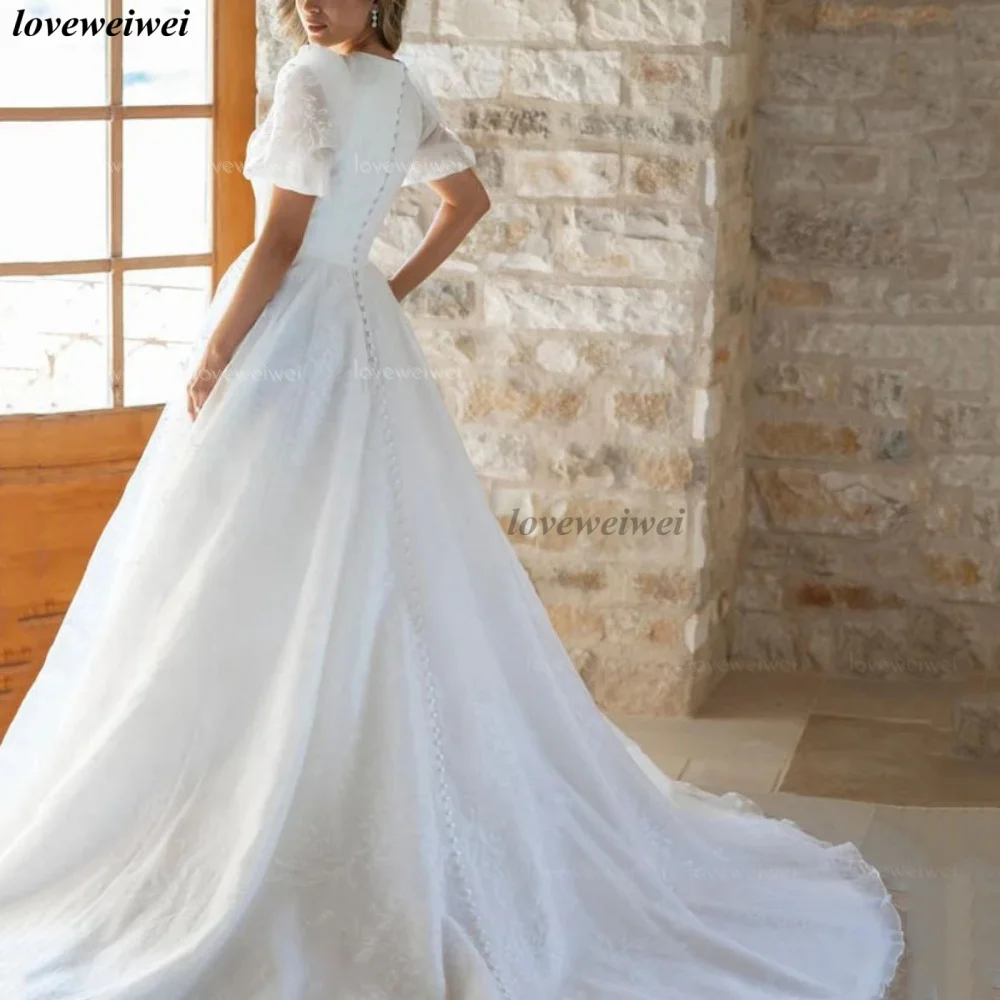 Suknia ślubna w nowoczesnym stylu, fason litery A, koronkowa, elegancka, z bufiastymi rękawami, dekolt okrągły, Vestidos De Novia