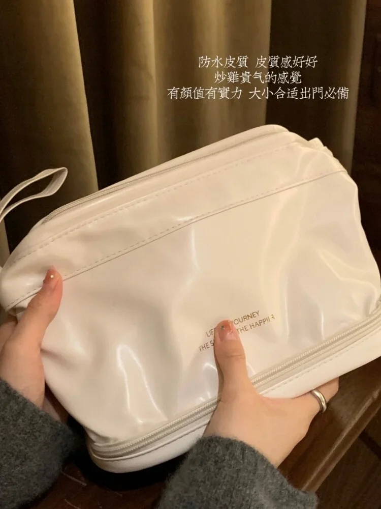 Large-capacity giant cloud double-layer cosmetic bag, new portable portable storage bag ins waterproof storage bag