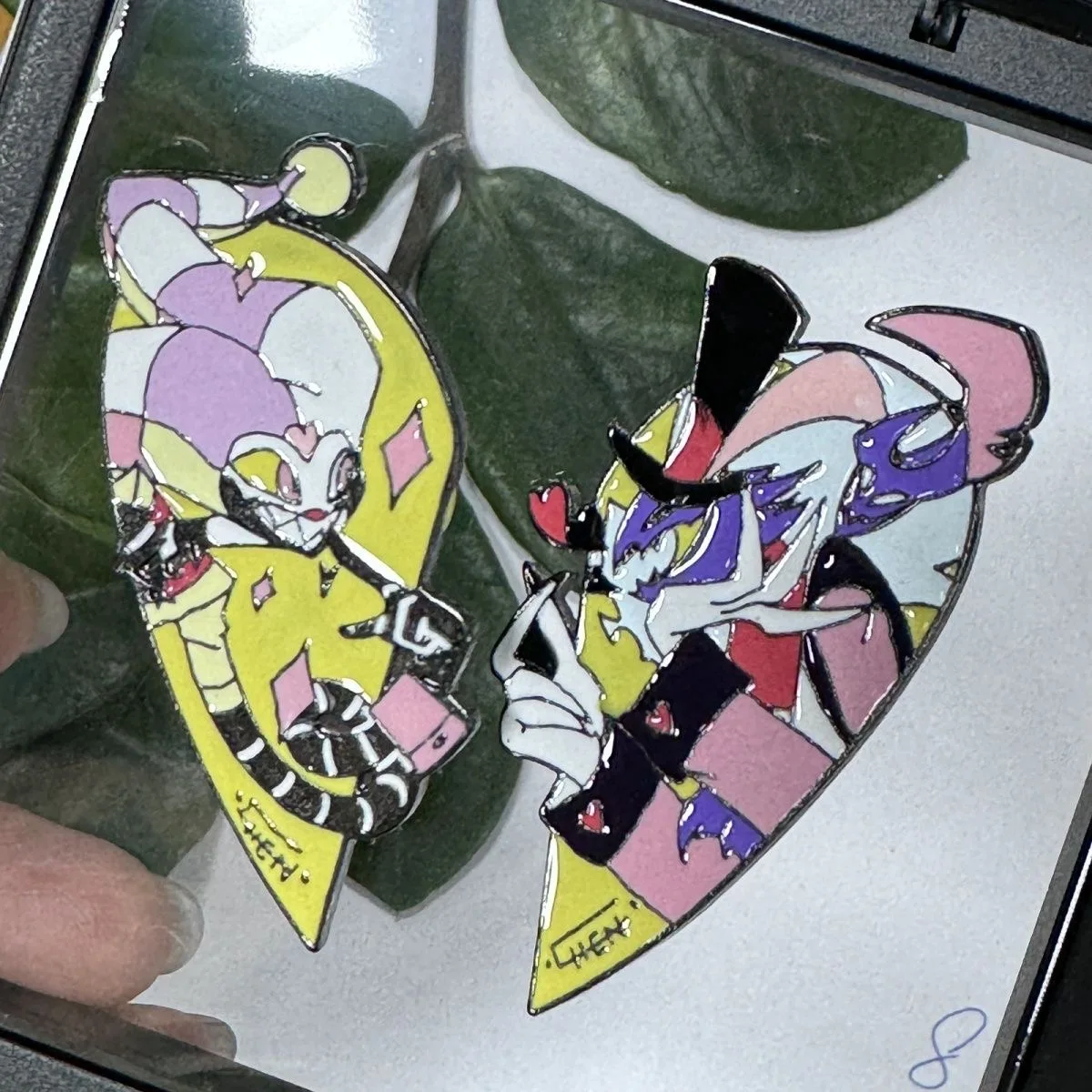 Cool enamel pin of a sci - fi warrior wielding a giant weapon. Vibrant colors, unique design. A must - have for genre fans.