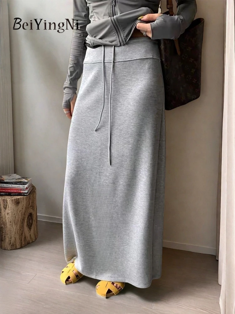 Beiyingni 2025 تنورة نسائية عصرية جديدة عادية سليم مرونة الخصر مستقيم سبليت ميدي التنانير الإناث عادية الكورية Faldas