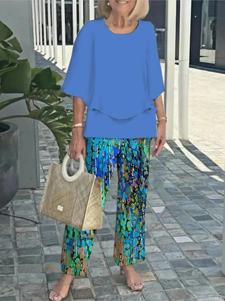 夏の新 2 点セット女性の O ネック 3/4 袖プリントパンツスーツカジュアルルーズ不規則なトップ + ワイドレッグパンツ 2 点セット