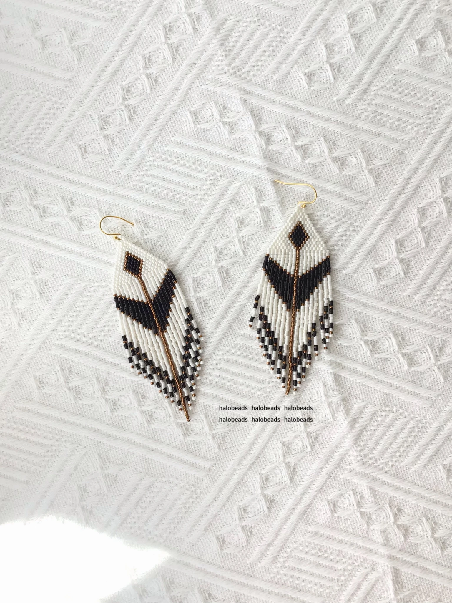 

ZGMXR Rice bead earrings Tassel Geometry Bohemia Alloy Hand-woven Original female Simple Color matching Fashion Beaded earrings