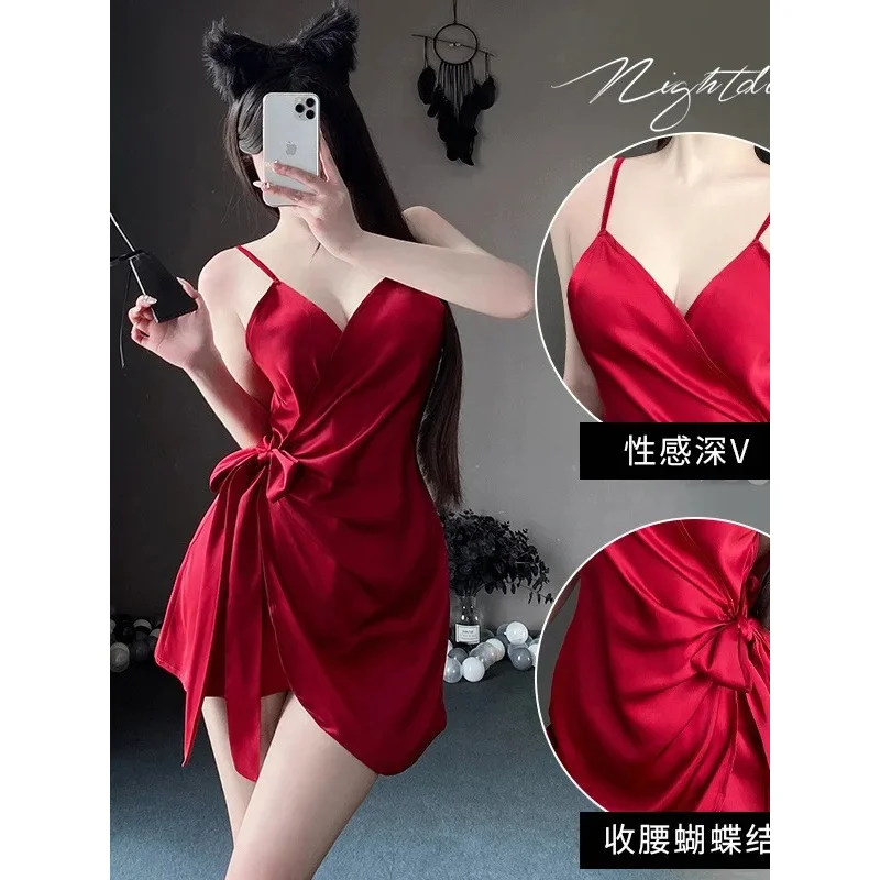 Nouveau tempérament Satin à lacets sangle suspendue Sexy col en v coupe ajustée cravate mince couleur unie à lacets robe de mode asymétrique