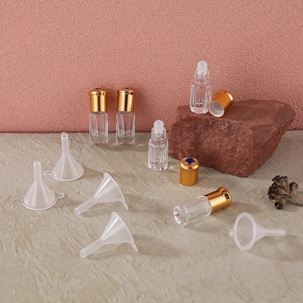 5 ชิ้น 3 มิลลิลิตรใสแปดเหลี่ยมขวดแก้วลูกกลิ้งเปล่า W/ฝาอัญมณีสีฟ้า 5 กรวยรีฟิลสำหรับน้ำมันหอมระเหยน้ำหอม