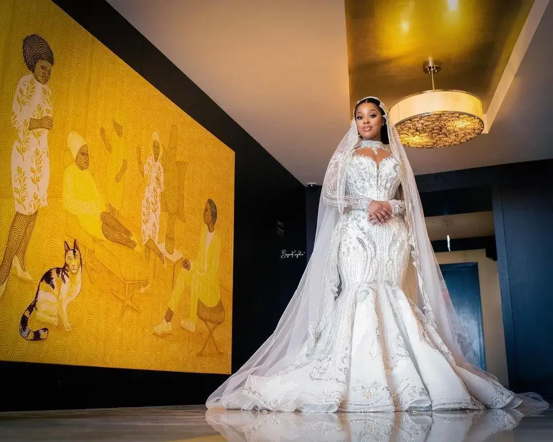 Dostosowana arabska suknia ślubna Aso Ebi Mermaid Plus Size Luksusowa suknia ślubna Illusion z długim rękawem Sheer High Neck Lace Crystal Bridal Gow