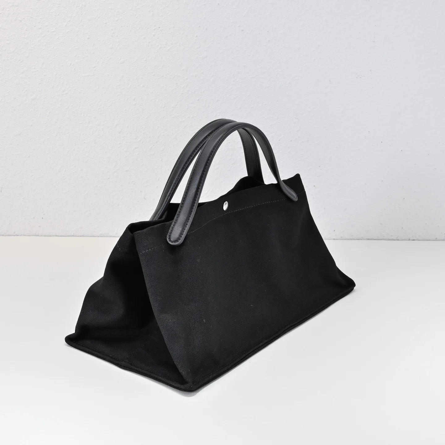 

2025 women top quality Canvas large-capacity hand-held shopping bag for women, suitable for casual outdoor travel use.
