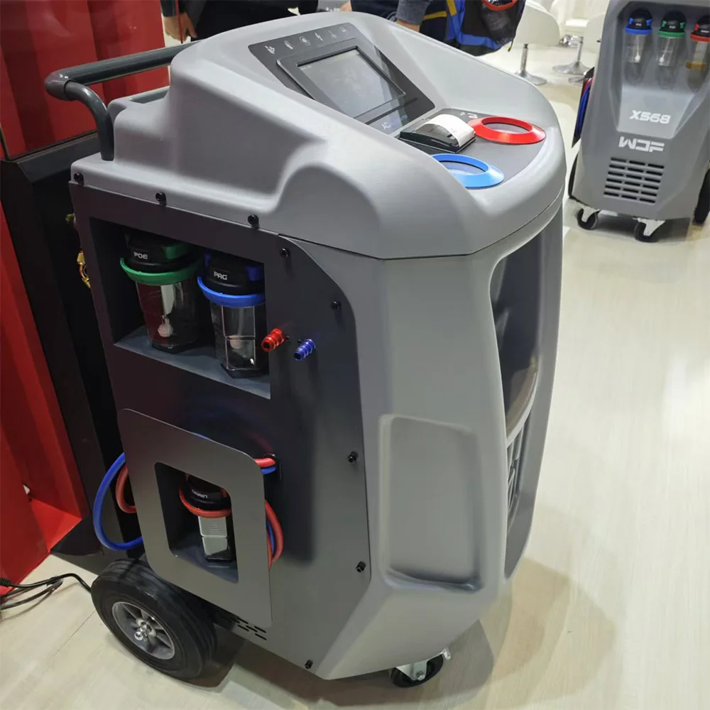 X545 Macchina automatica per il recupero e il rifornimento del refrigerante dell'aria condizionata Rilevamento automatico delle perdite di riempimento sottovuoto