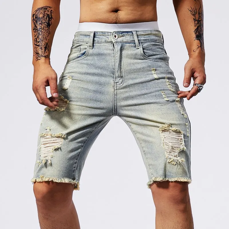 Spodenki jeansowe w stylu vintage męskie amerykańskie rozciągliwe obcisłe dżinsy moda zgrywanie Streetwear męskie dziury postrzępione krótkie spodnie niebieski czarny