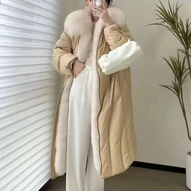 UMI MAO เสื้อแจ็คเก็ตดาวน์ยาวผู้หญิงฤดูหนาวใหม่หนาการออกแบบเฉพาะพร้อมขนสุนัขจิ้งจอกคอปกขนาดใหญ่เสื้อแจ็คเก็ตดาวน์ผู้หญิง