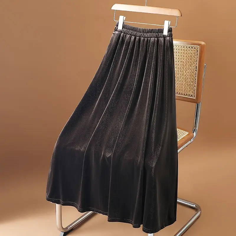

Женская весенне-осенняя новая элегантная юбка трапециевидной формы средней длины с высокой талией для похудения, золотистая бархатная универсальная юбка средней длины