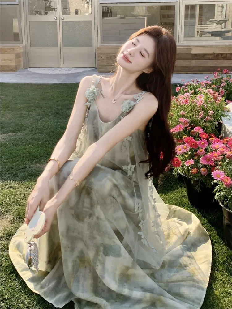 A new vacation-style lace halter dress with of elegance and atmosphere