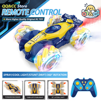 Cool Light Rc Stunt Car 2.4G 4WD Gesture Sensor with Spray Deformation Sound Remote Control Stunt Off-road Drift Car Toy for Kid