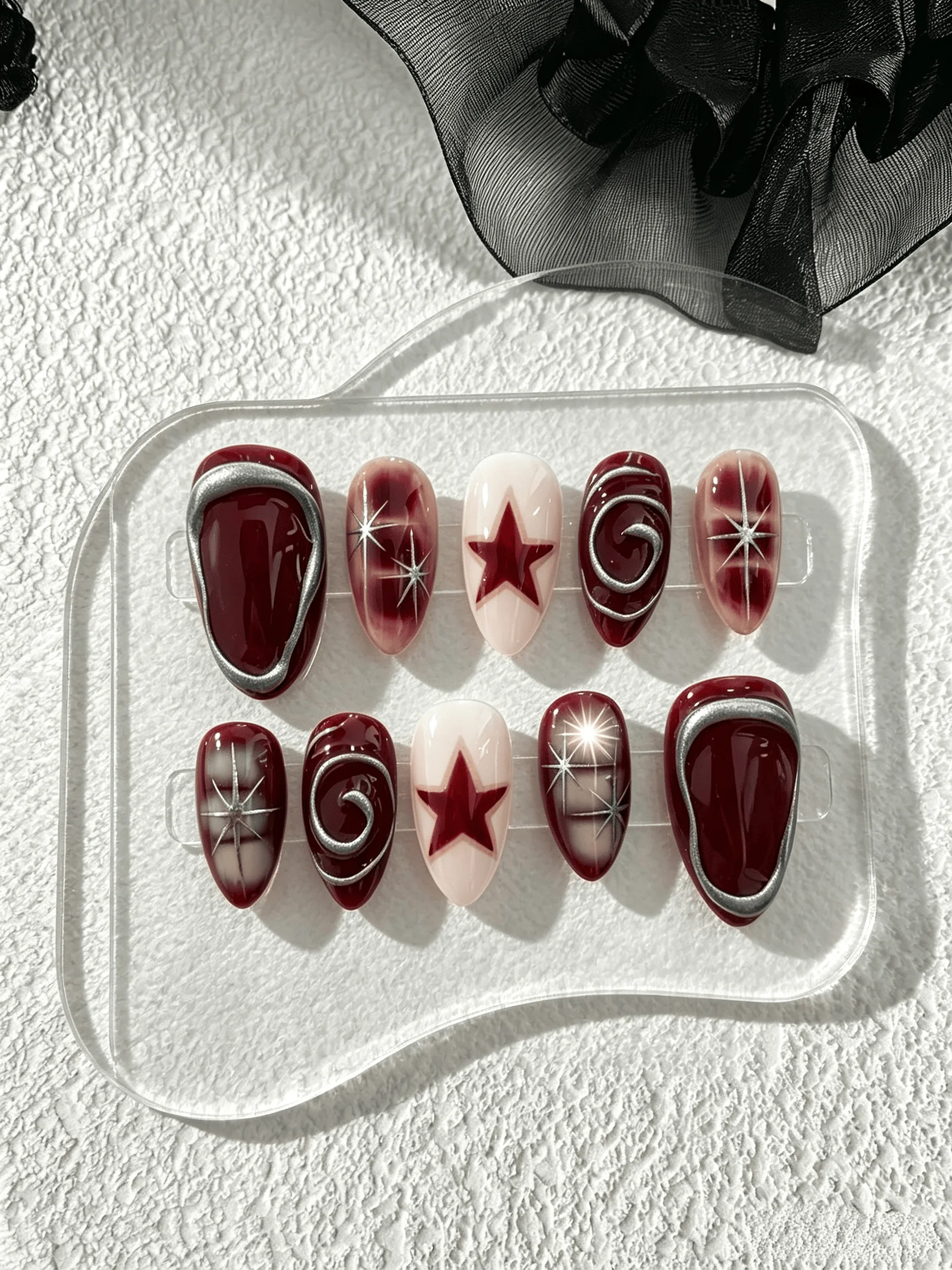 10 Pieces of Handmade Almond-Shaped Full-Cover Nail Tips, Medium Length, in Wine Red and Dark Red, with a Cool Star Style, Suitable for Women and Girls, Perfect for Music Festivals, Trendy Parties, and as a Gift, Comes with 1 Piece of Jelly Glue and 1 Nail File