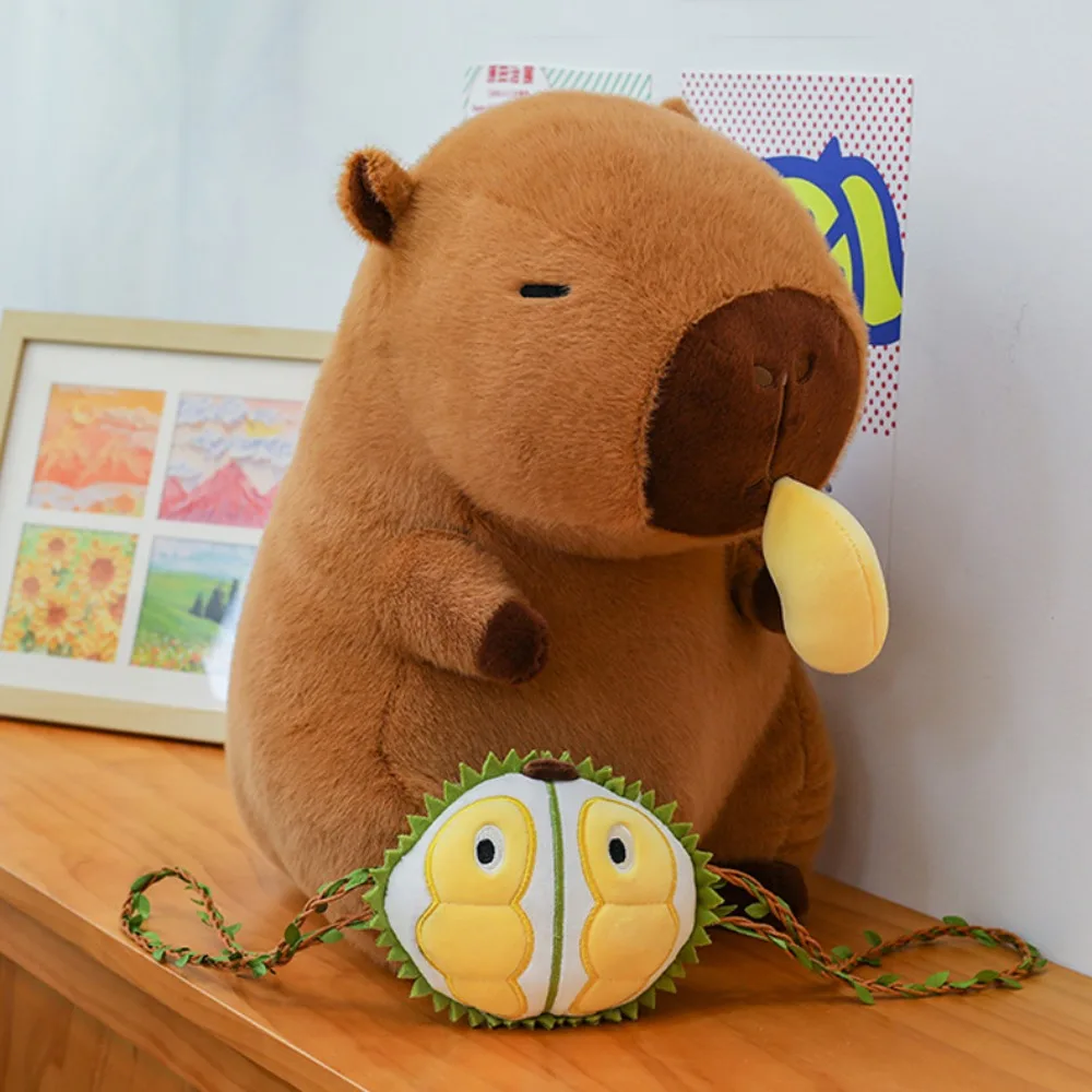 Manger Durian Capybara peluche poupée peut tirer PP coton Simulation Capybara ornements peluche fruits sac à dos peluche Capybara poupée