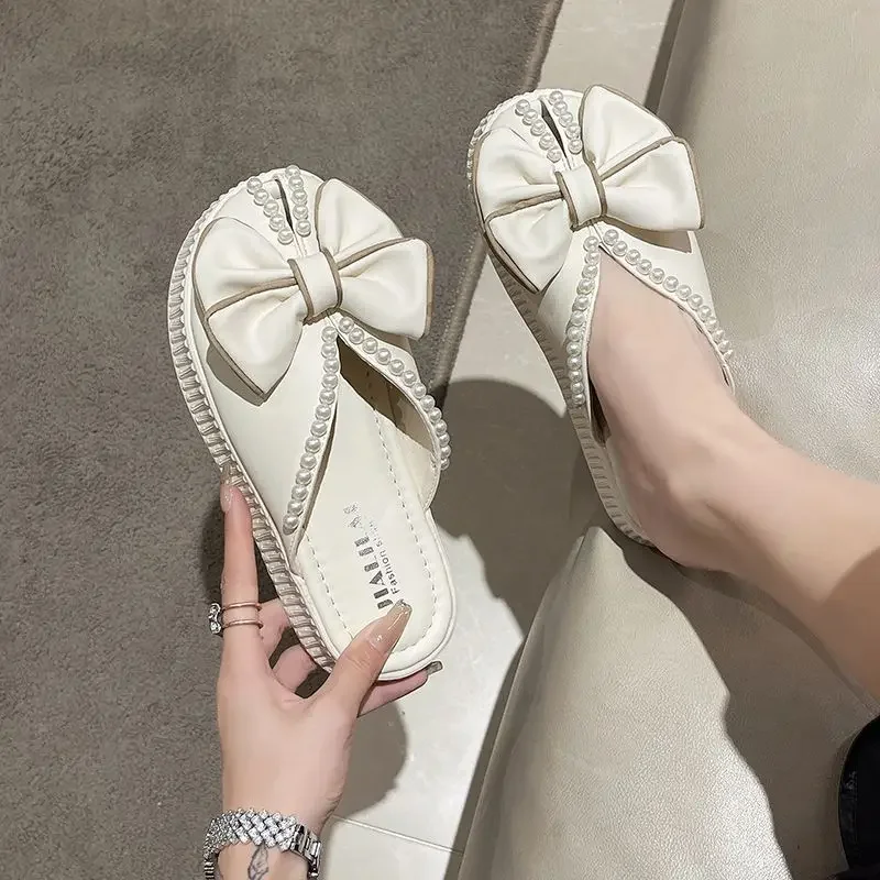 Mules de interior con punta redonda para mujer, sandalias de Casa amarillas con perlas Kawaii, zapatos gruesos con lazo