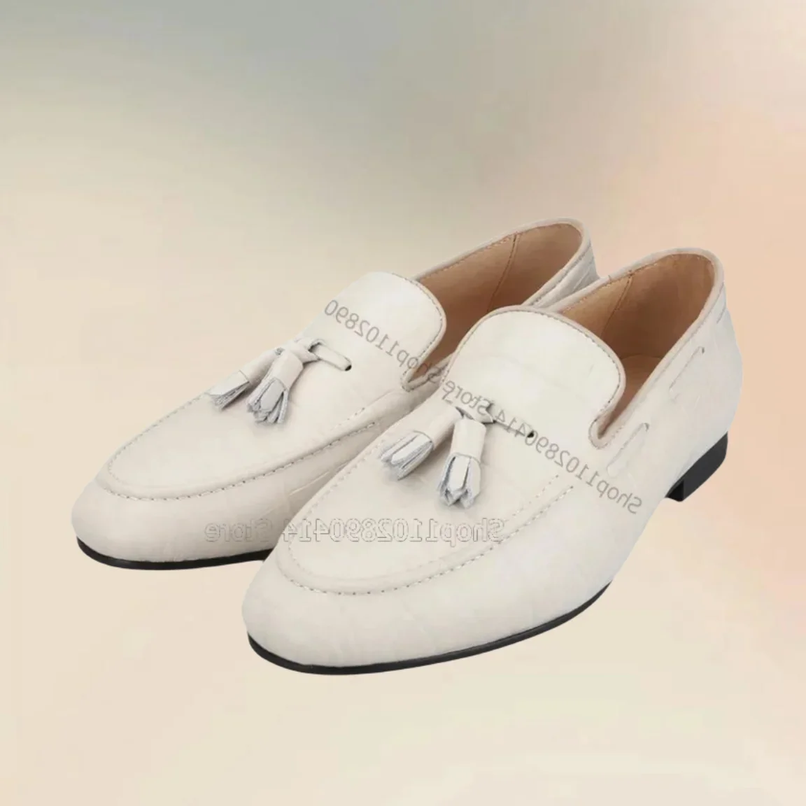 Белые лоферы с кисточками и декором в клетку