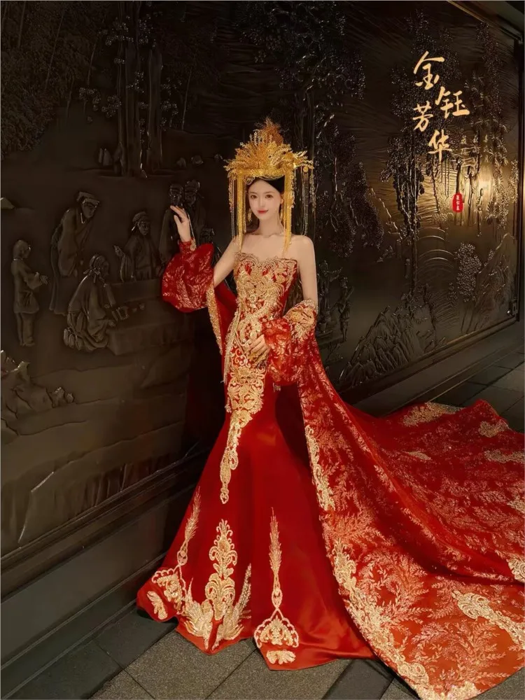 The dragon and phoenix is a luxurious elaborately embroidered Chinese wedding dress toasting