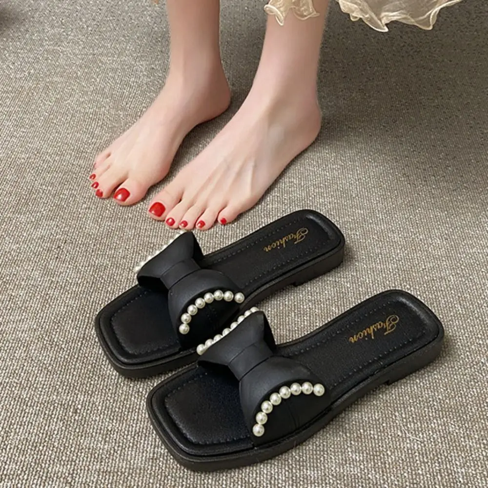 كل مباراة لينة وحيد Bowknot نعال مسطحة بولي كلوريد الفينيل الحلو اللؤلؤ الشرائح الصنادل أحذية المضادة للانزلاق منخفضة الكعب النعال النساء النساء