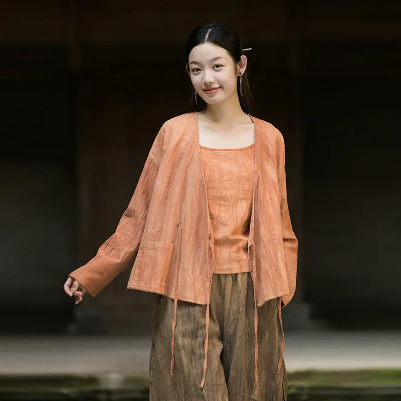 

Artisan Tie-Dye Zen Coat: An original design featuring a relaxed, asymmetrical sash.