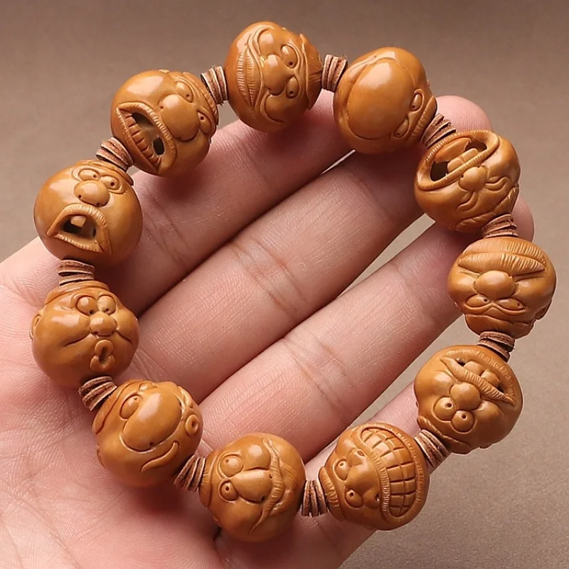 Iron Core Handmade Fun Olive Stone Bracelet With Big Bucktooth Expression, Hollow-Out Design, Short Round Beads