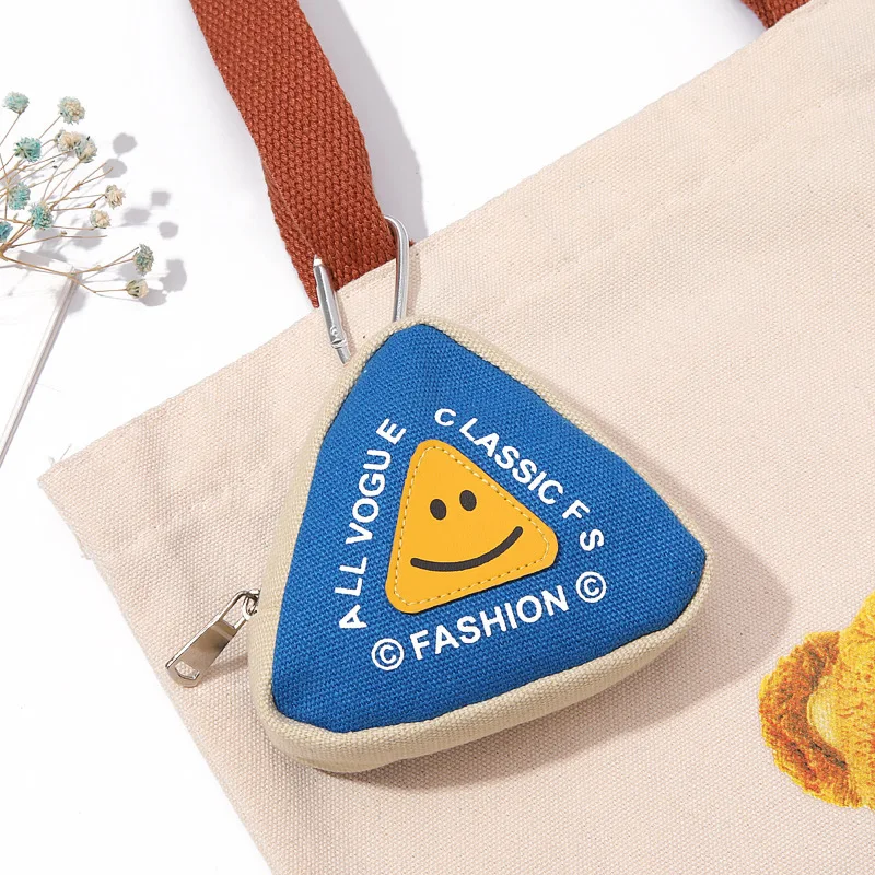 The new outdoor portable storage bag with contrasting colors, coin key bag, loose change, earphone bag, schoolbag and pendant
