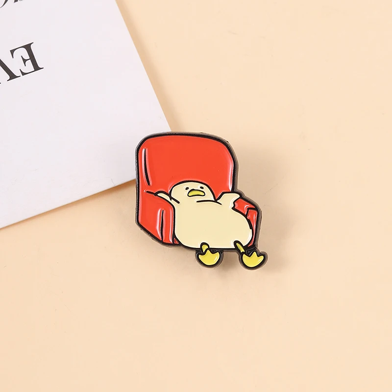 Cartoon Tired Duck Enamel Pin Cute Duck Slouching on Red Couch Brooch Bag Lapel Badge Jewelry Gift for Stressed Office Workers