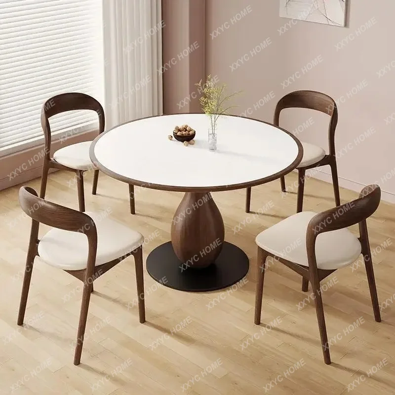 A  Solid wood rock slab dining table round home medium and ancient style high-end full support dining table and chair