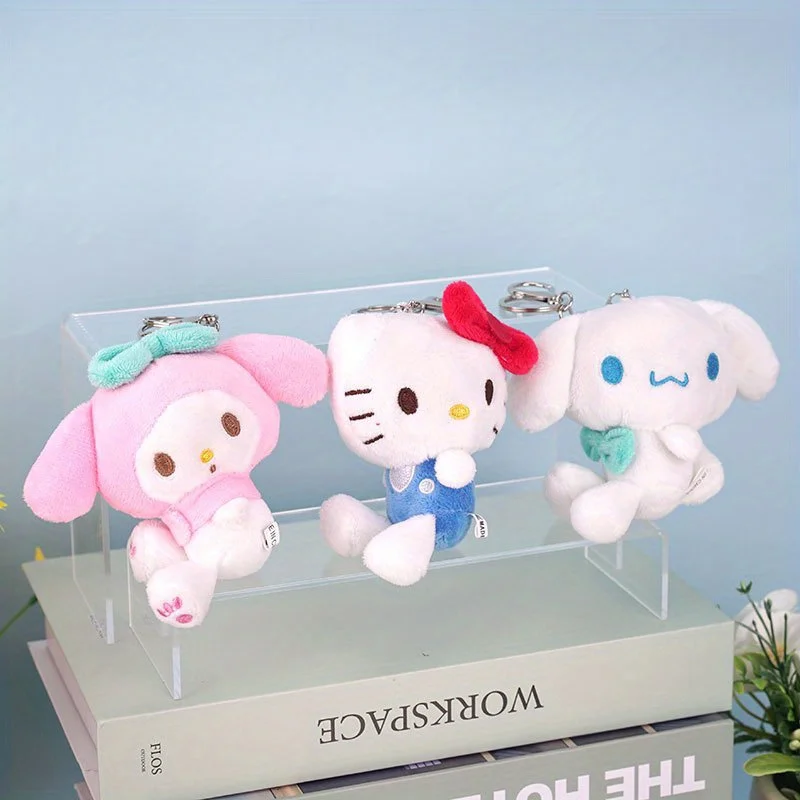 

Официальный плюшевый брелок Sanrio Hello Kitty, модный брелок для сумки Melody, брелок Kuromi, брелок для рюкзака Yugui Dog, подходит для различных сумок и рюкзаков.