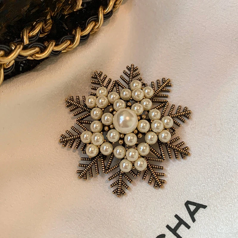 

Retro snowflake pearl brooch high-end exquisite fashion design sense niche high-end women's brooch pin