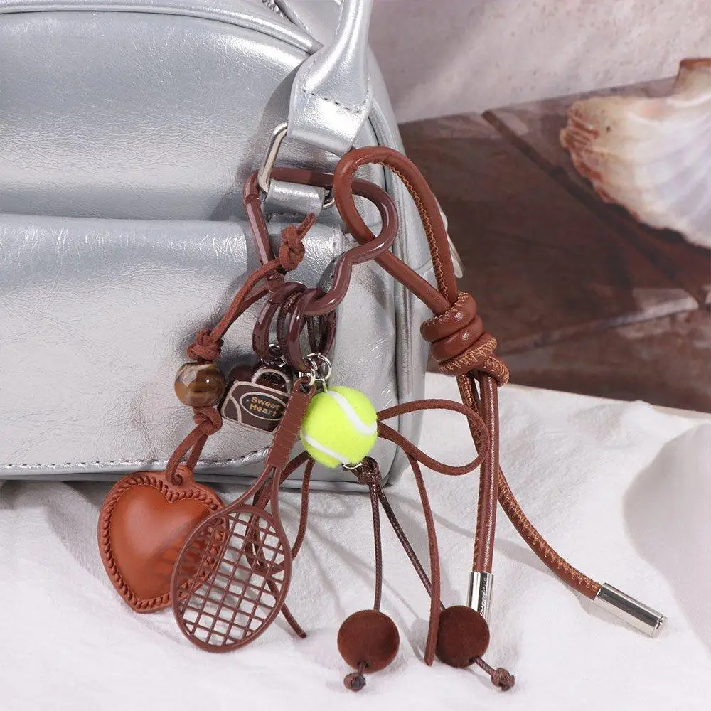 Miu Style marron arc coeur sac pendentif en cuir à la main Tennis porte-clés mignon sac à dos décor coréen charme corde porte-clés porte-clés