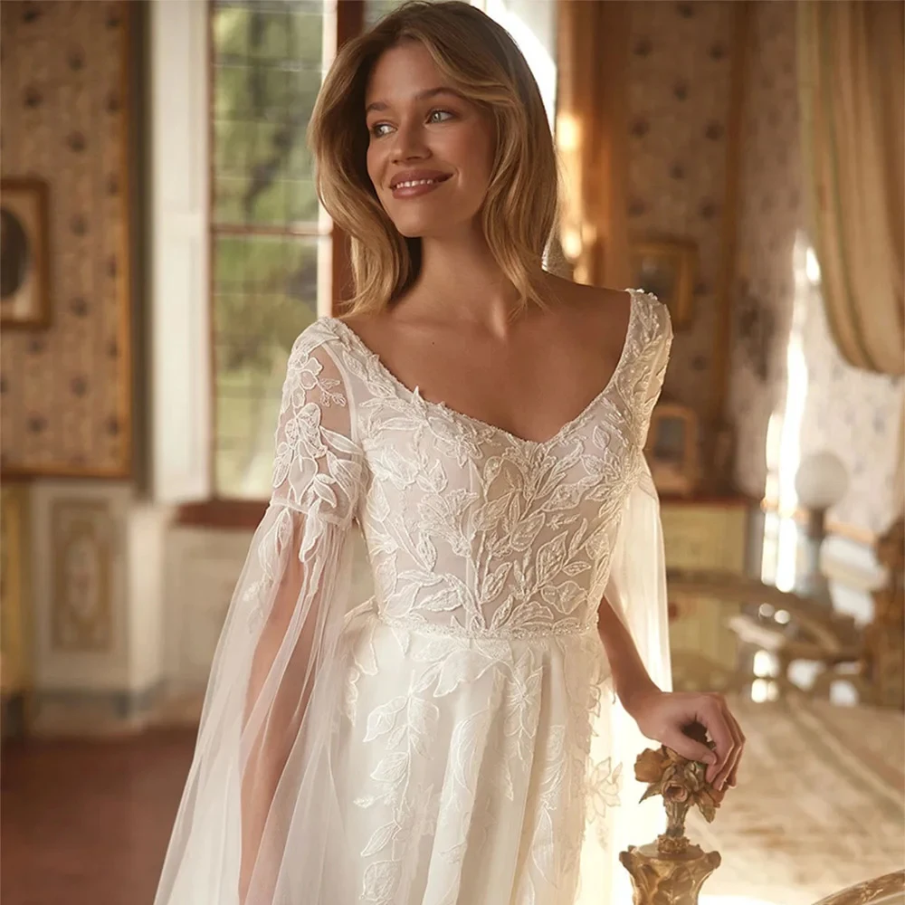 Nowoczesne suknie ślubne koronkowe szyte na miarę z długim rękawem suknia dla panny młodej miękki tiul koronka linia A tren dworski فستان حفلات