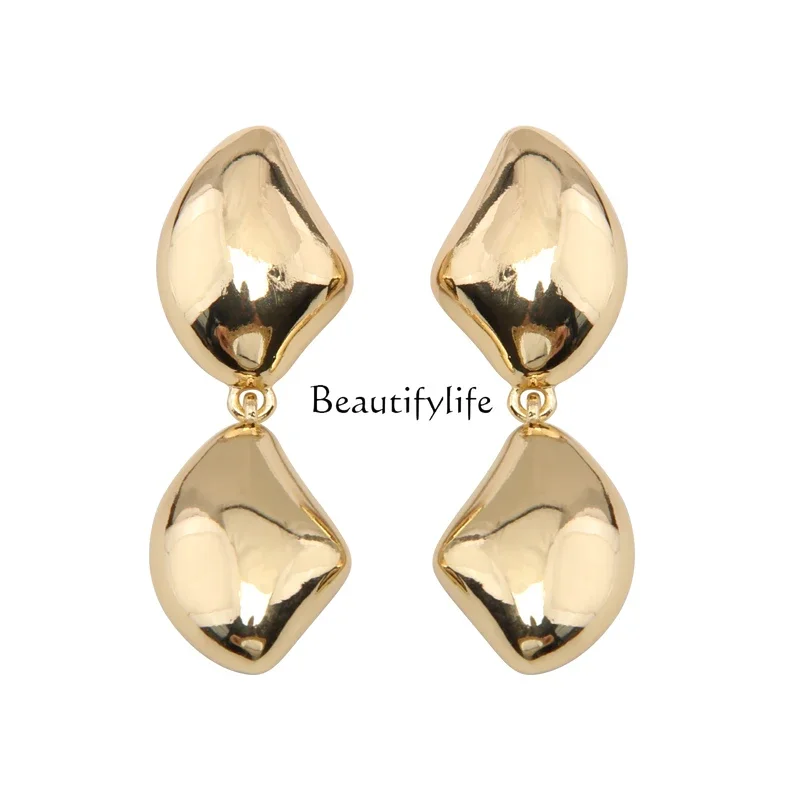 

Minimalist metal shell swaying long earrings light luxury high sense unique exaggerated stud earrings