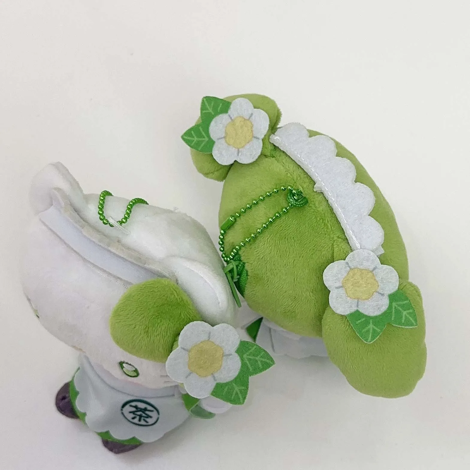 12 cm Sanrio Plushier chat mignon frais Matcha femme de chambre série KT mélodie peluche poupées portefeuille poupée sac pendentif