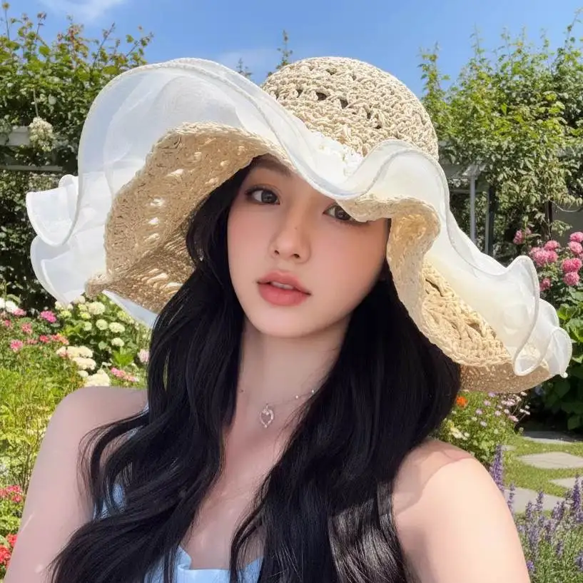 Sombrero de paja tejido a mano para mujer, nuevo estilo de verano, para vacaciones en la playa, con diseño hueco, ala ancha, protección solar, sombrero de pescador.