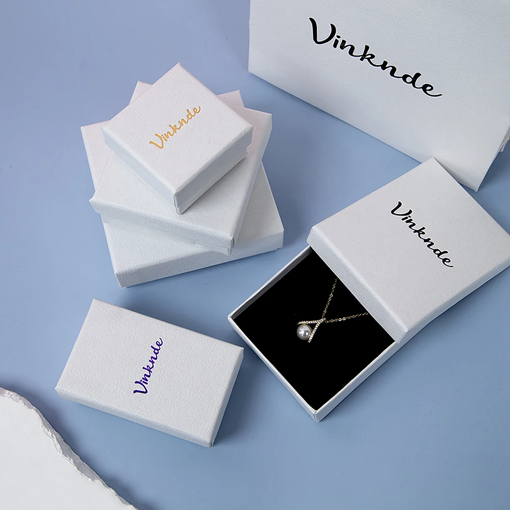 

Пользовательский логотип, горячая распродажа, бумажная шкатулка для драгоценностей, маленькая свадебная подарочная коробка, браслет, серьги, кольцо, кулон, упаковка для ювелирных изделий, пылесборник