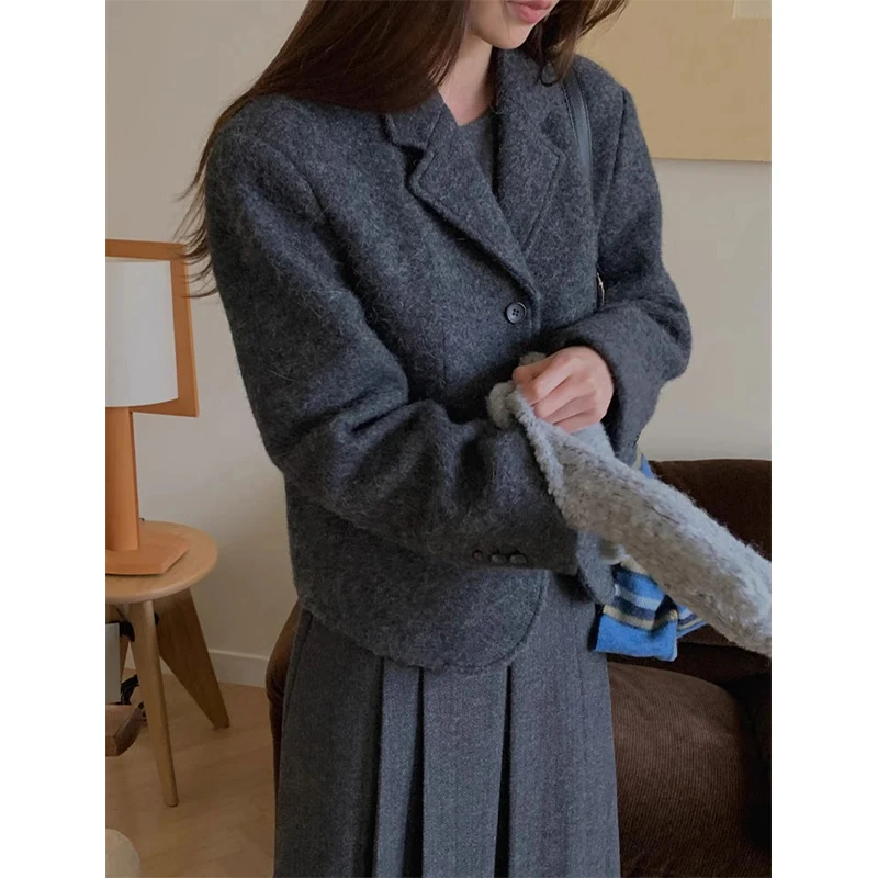 Retro Pendolare Coreano Dongdaemun 24 Autunno collare trench e trench abito di lana Jaet più gonna a pieghe Faion da donna