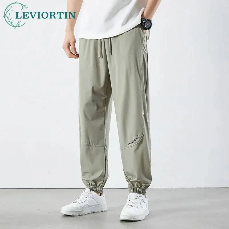 

Summer men's fashionable and versatile street wear, thin ice silk loose casual sports, slow jogging, ankle tied cropped pants