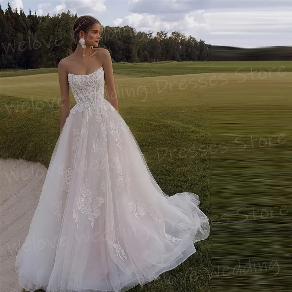 Prachtige A-lijn vrouwen Kant Applicaties Strapless Trouwjurken Robe De Mariée Aangepaste Backless Bruid Toga Vestido De Novia