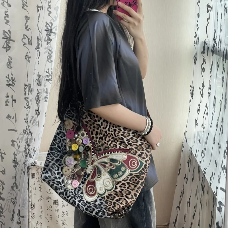 

Original Fashion Retro Leopard Print Spicy Girl Embroidery Fringed Butterfly Button Large Capacity Diagonal Cross Bag