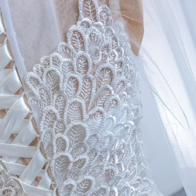 Customized 2025 White Fishtail Wedding Dress High Neck Transparent Mesh Long Sleeves White Lace Back Strap Elegant And Noble