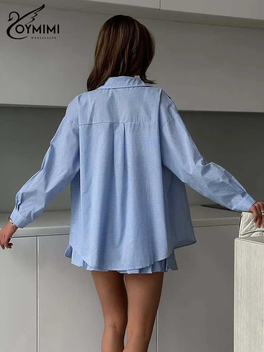 ชุดเซ็ตสองชิ้นสำหรับผู้หญิงลายพิมพ์สีน้ำเงินลำลอง แบรนด์ Oymimi เสื้อเชิ้ตแขนยาวติดกระดุมแถวเดียวมีกระเป๋า และกระโปรงมินิสเกิร์ตผูกเชือก