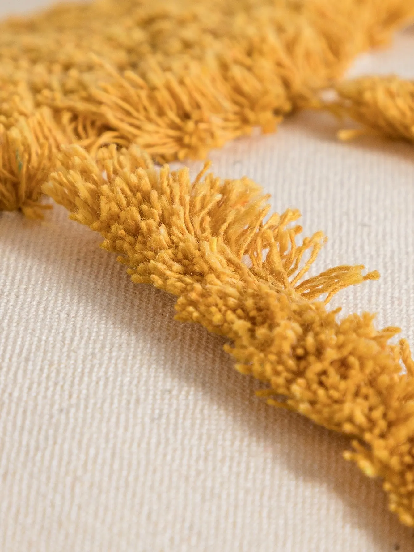 A yellow sun pattern pillowcase cover made of Bohemian cotton sail fabric with tufting technology for sofas, bedrooms，bed